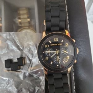 Michael Kors black and gold rubber material